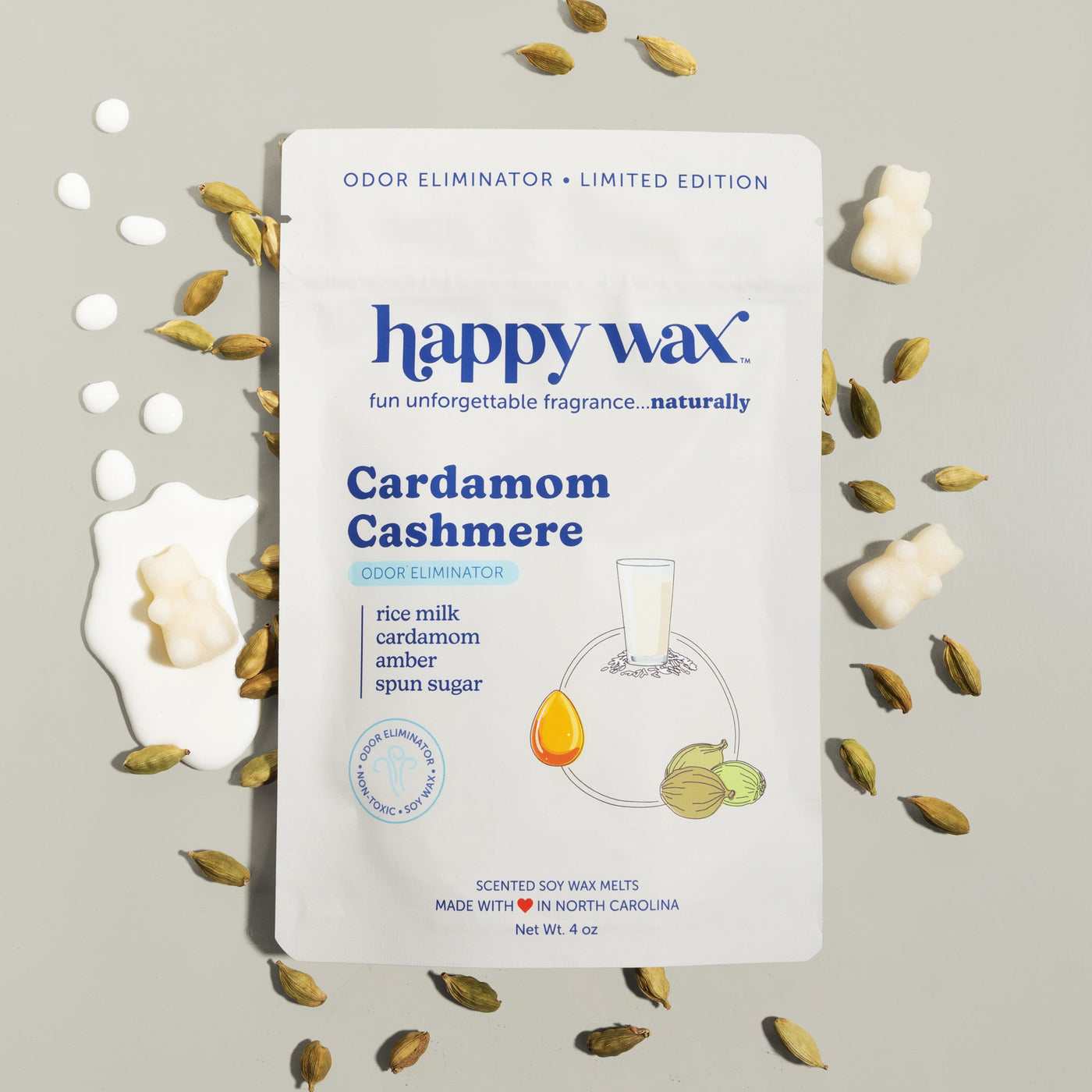 Happy Wax Cardamom Cashmere pouch with cardamom, rice milk and wax bears on grey background