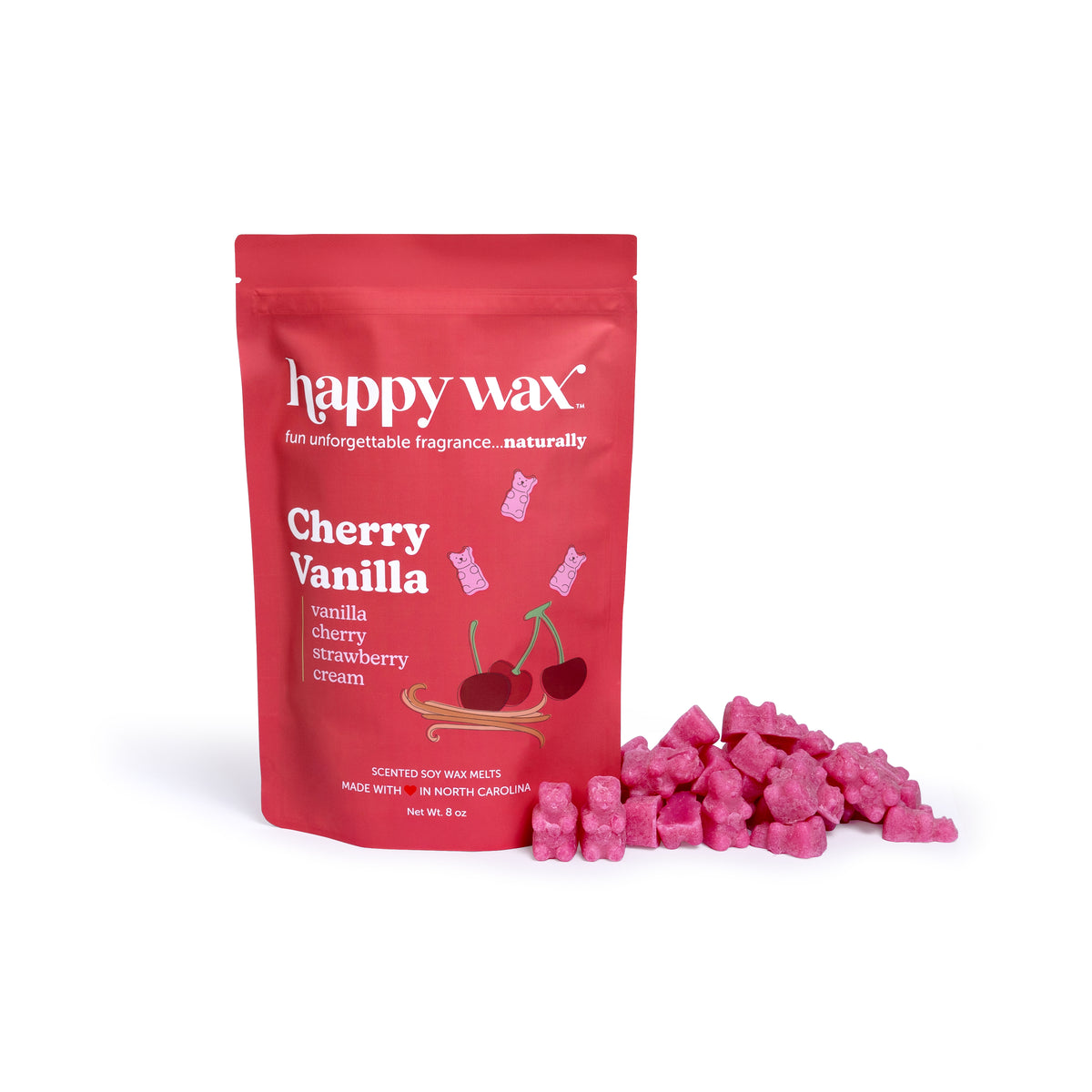 Red pouch of Happy Wax Cherry Vanilla soy wax melts with pink wax cubes scattered beside it.