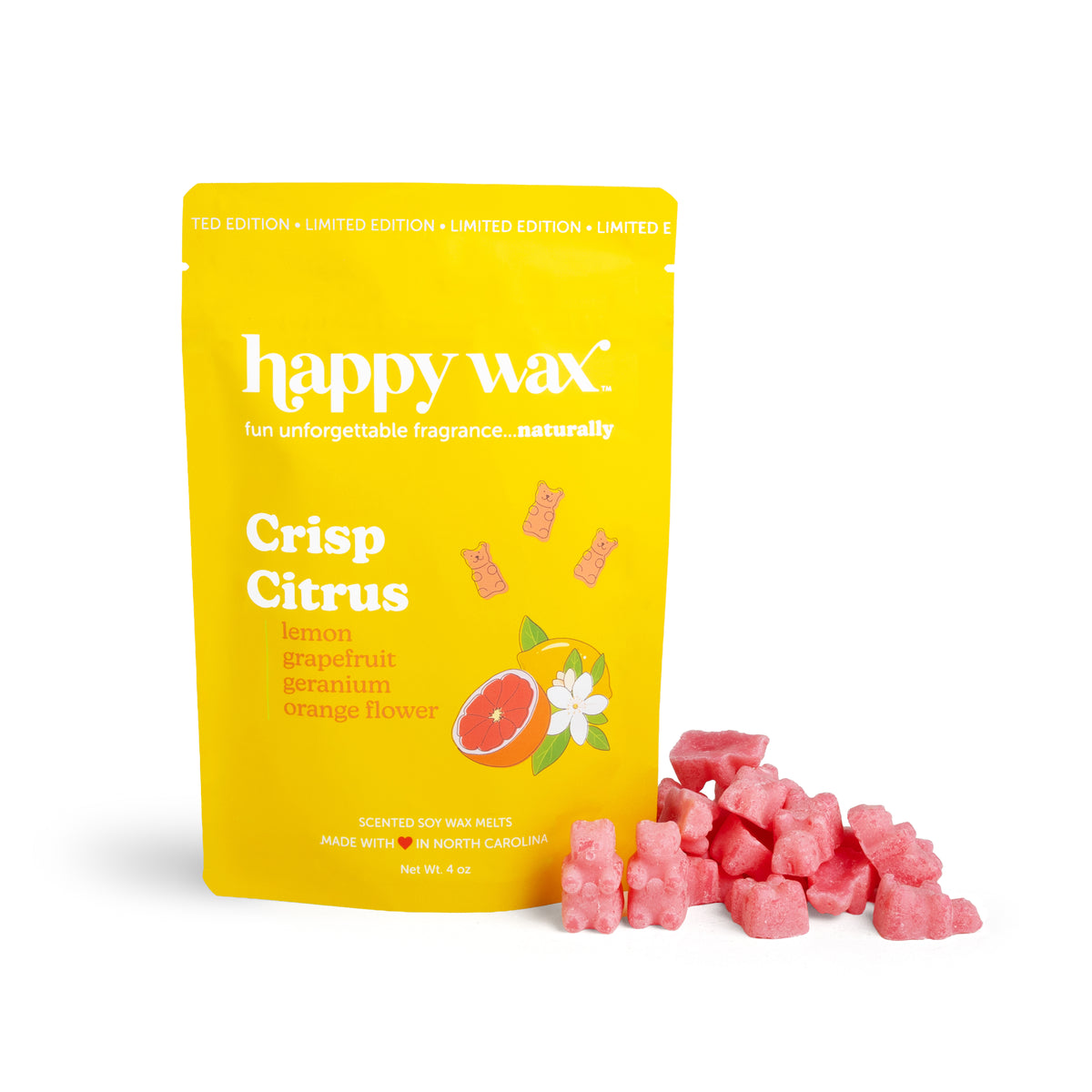 Yellow pouch of Crisp Citrus wax melts with pink wax chunks displayed in front.