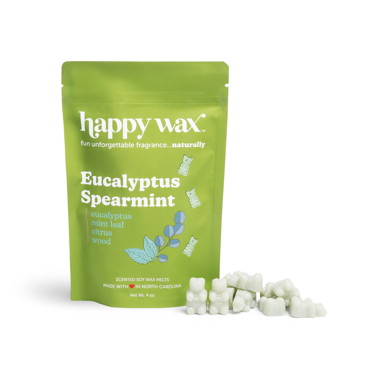 Green pouch of Happy Wax eucalyptus spearmint scented soy wax melts with white wax cubes displayed beside it.