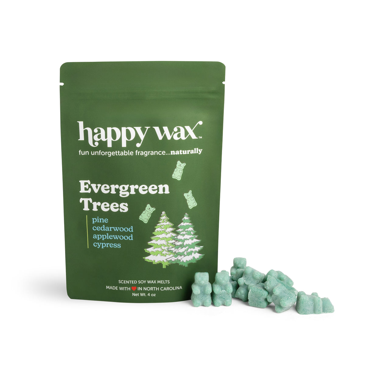 Green pouch of Happy Wax Evergreen Trees wax melts with light green wax cubes displayed beside it.