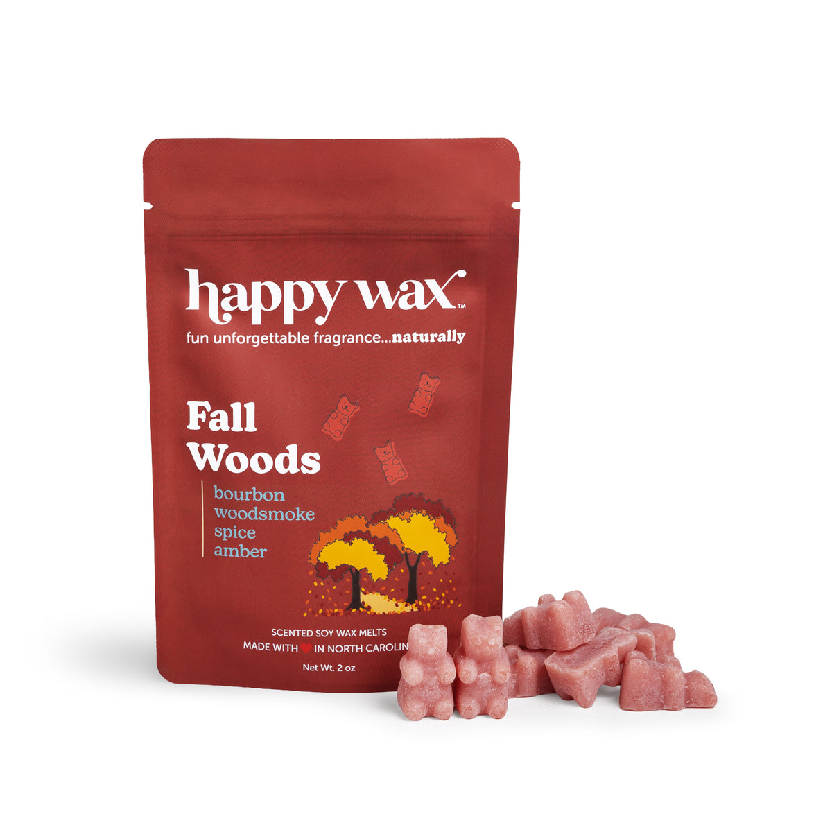 Red pouch of Happy Wax Fall Woods soy wax melts with pink wax chunks displayed in front.