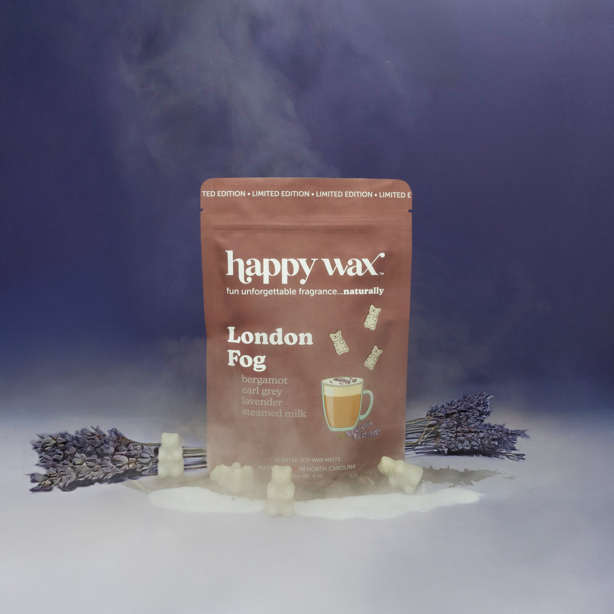 Brown Happy Wax pouch of London Fog wax melts surrounded by cream-colored wax chunks and dried lavender sprigs.