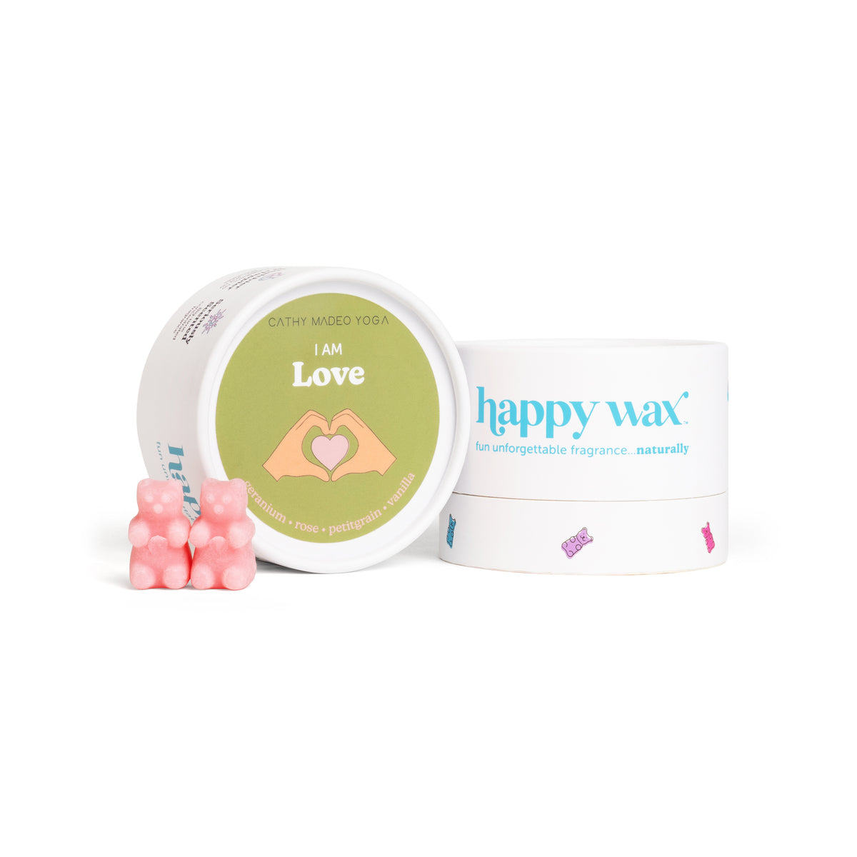 Pink wax melts with "I am Love" labeled container and happy wax branded packaging.