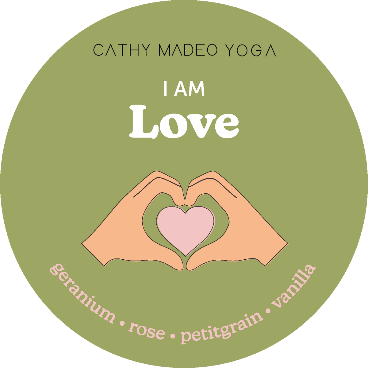 Olive green circular label with hands forming a heart shape and "I AM Love" text by Cathy Madeo Yoga.