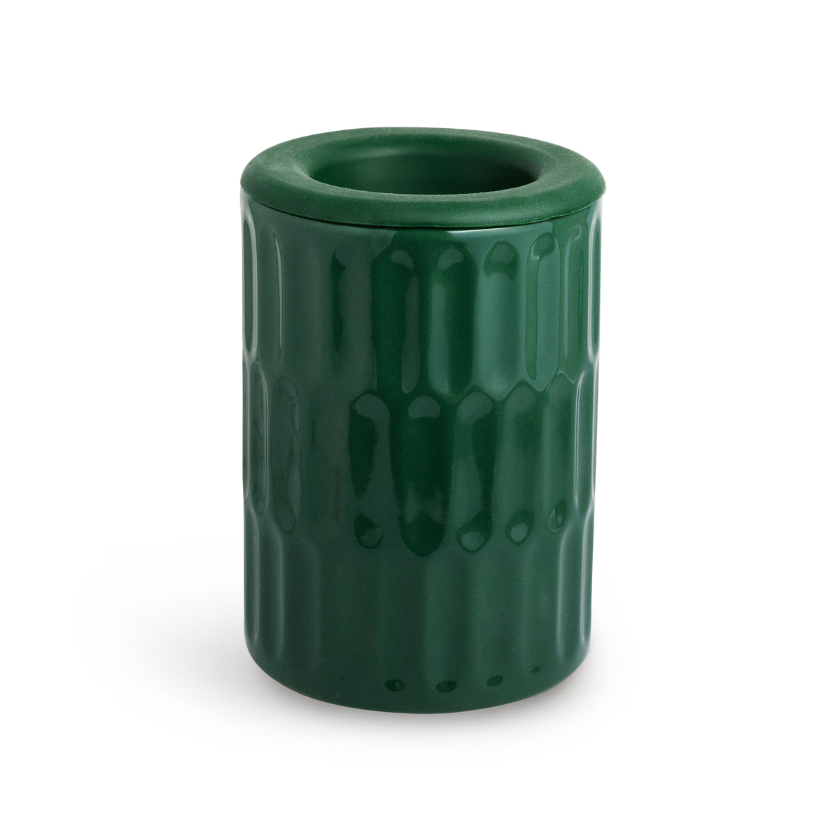 Green cylindrical wax warmer with textured vertical pattern and open top.