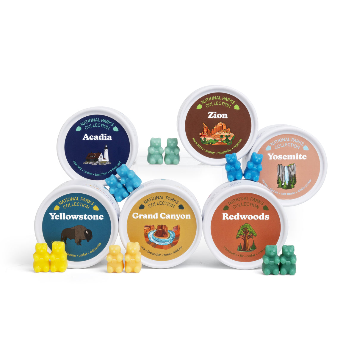 Six circular containers labeled Acadia, Zion, Yosemite, Yellowstone, Grand Canyon, and Redwoods, each with colored wax cubes.