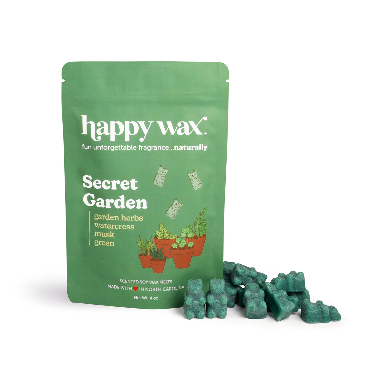 Green resealable pouch of Happy Wax brand Secret Garden scented soy wax melts with green wax chunks displayed beside it.