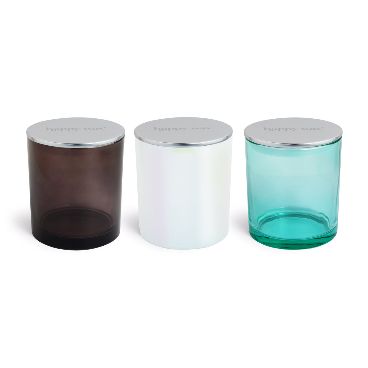 Three cylindrical glass wax melt jars in dark brown, white, and turquoise with silver metal lids.
