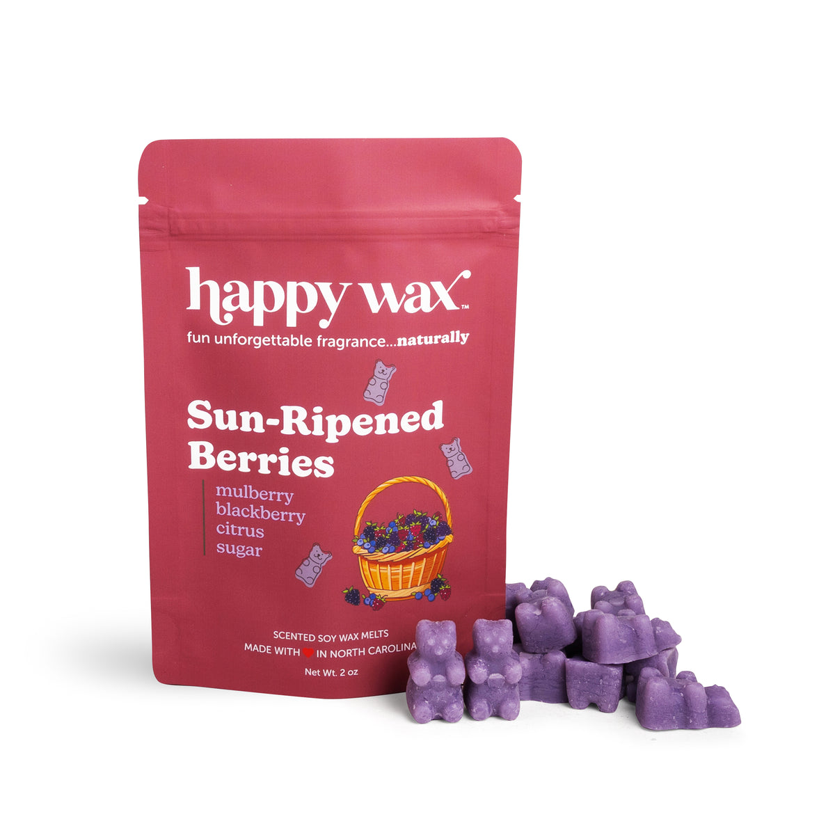 Pink Happy Wax pouch labeled "Sun-Ripened Berries" with purple wax melts displayed in front.