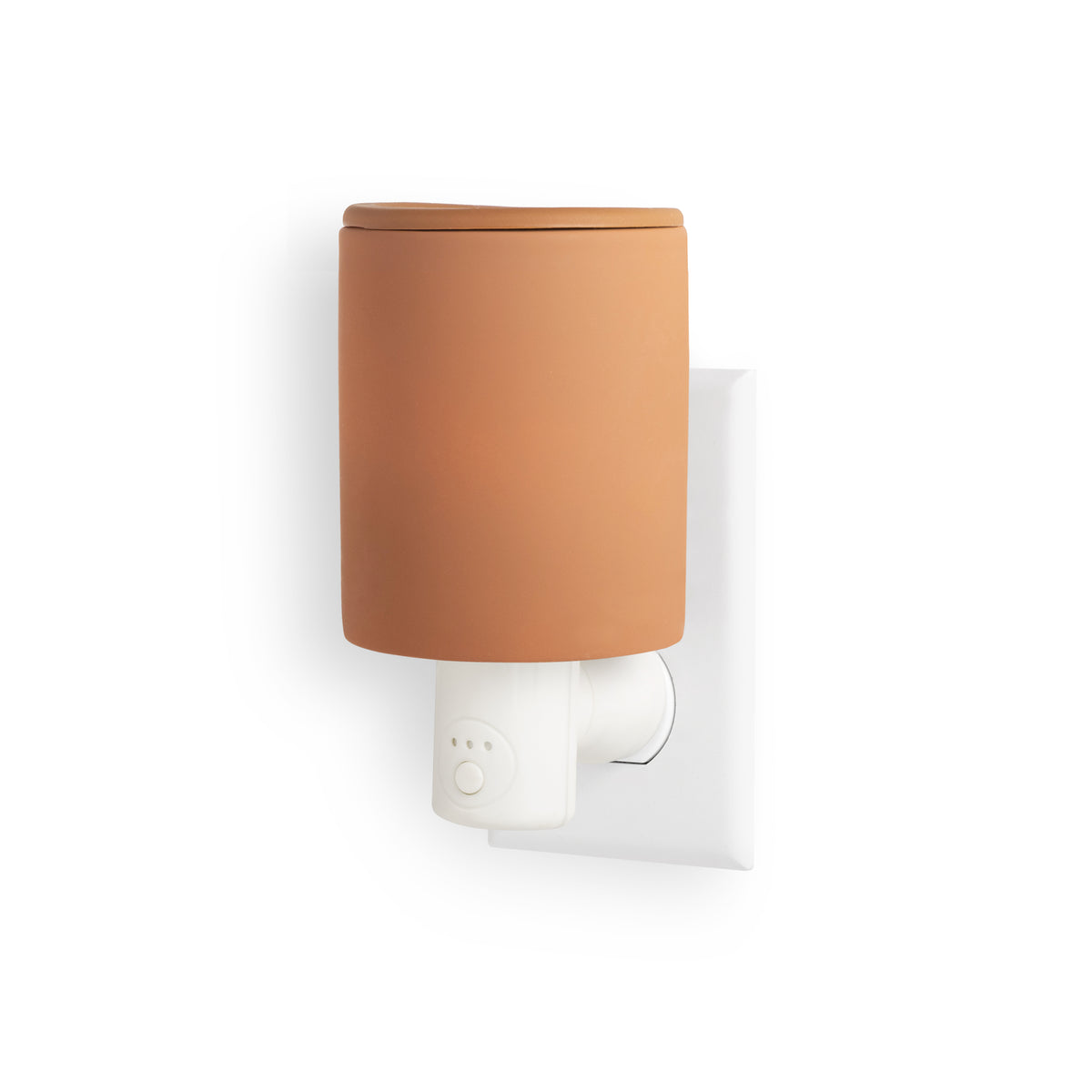 Terracotta ceramic wax warmer with white plug-in base and timer controls mounted on wall outlet.