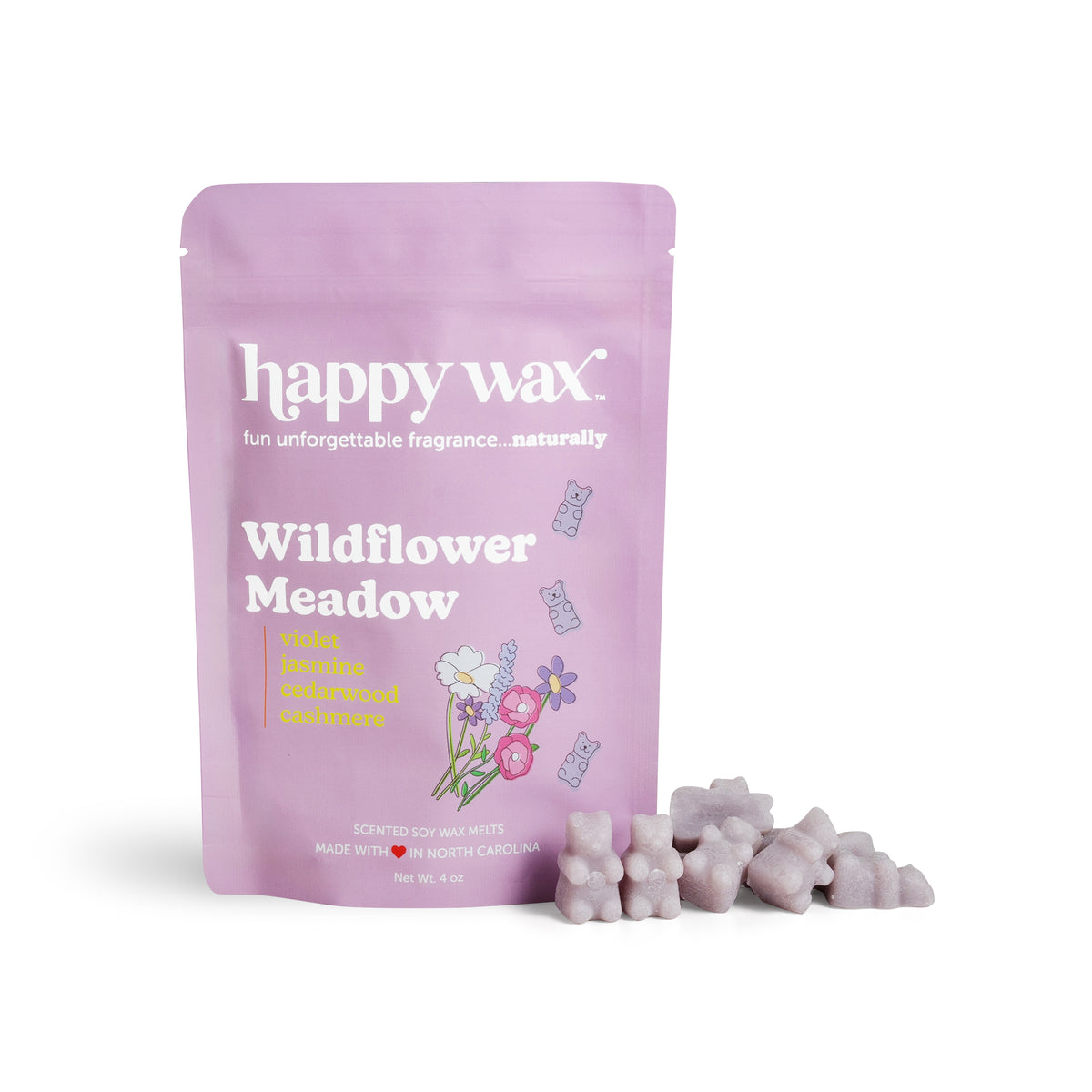 Purple pouch of Happy Wax brand Wildflower Meadow scented soy wax melts with floral graphics and loose wax melts displayed be
