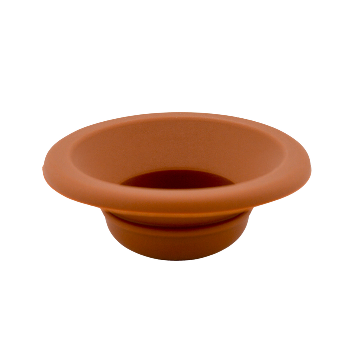 Terracotta silicone dish with wide flared rim and central opening for outlet warmer use.