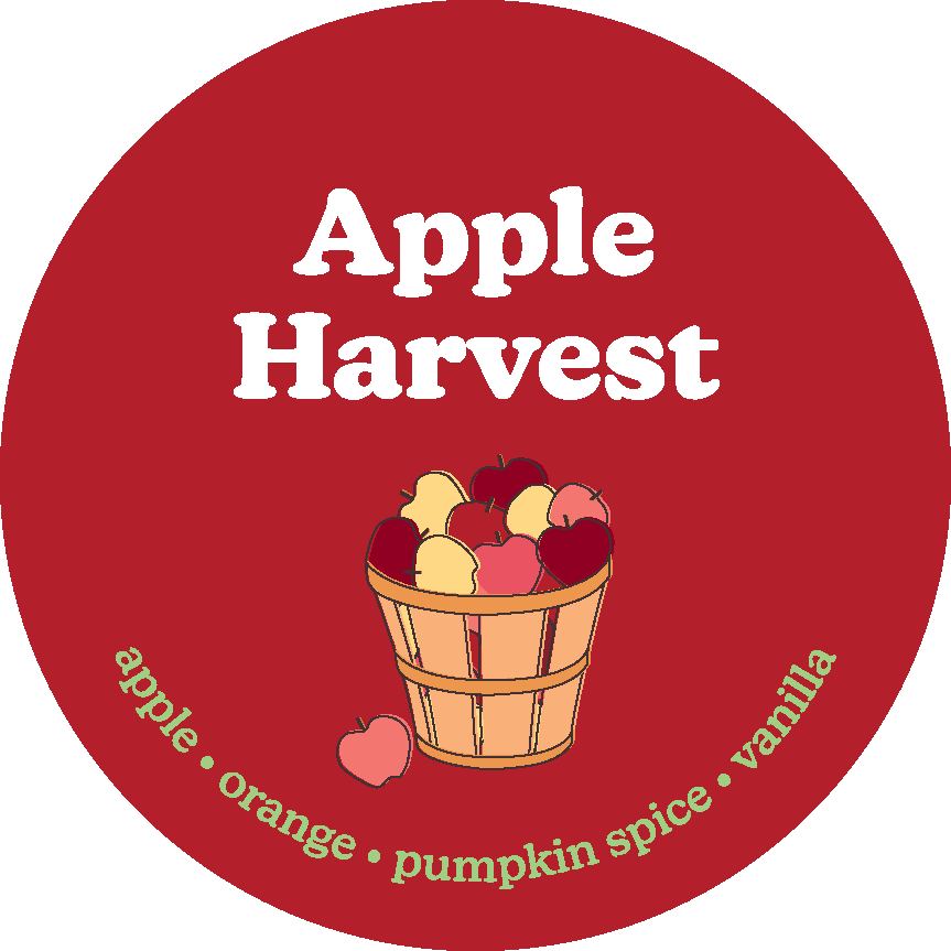 Red circular label with "Apple Harvest" text, basket of apples illustration, and scent notes listed around the edge.