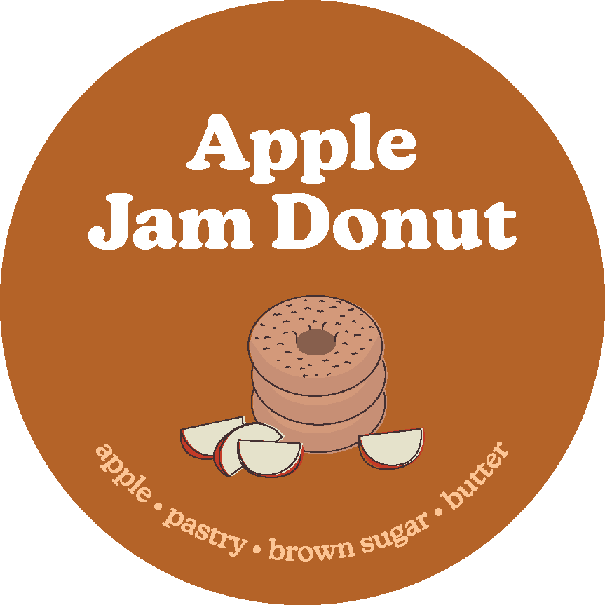 Circular brown label with white text reading "Apple Jam Donut" and illustration of stacked donuts with apple slices below.