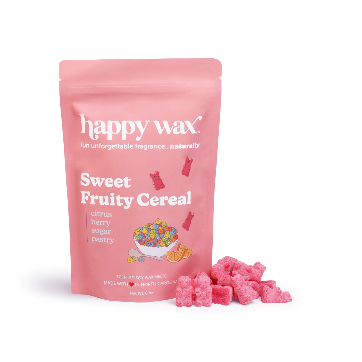 Pink wax melt chunks displayed next to Happy Wax brand packaging labeled Sweet Fruity Cereal.