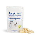 White pouch of Happy Wax Blooming Vanilla soy wax melts with cream-colored wax pieces displayed beside it.