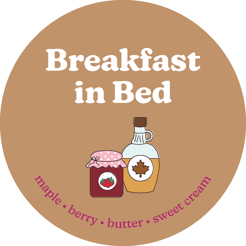 Tan circular wax melt label with "Breakfast in Bed" text, jam jar and maple syrup bottle illustration, and scent notes listed