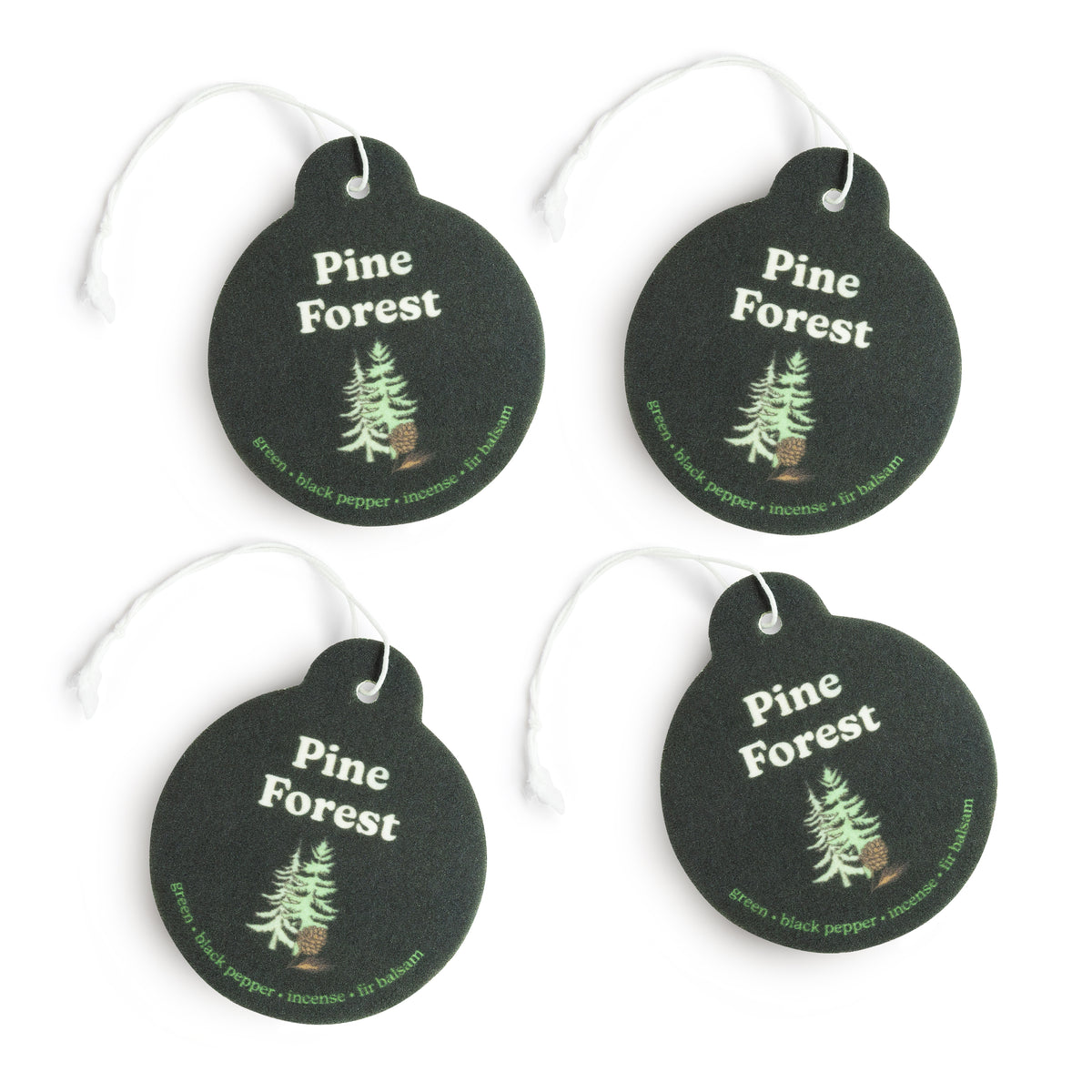 Four dark green round car charms with white string loops, each printed with "Pine Forest" text and a pine tree illustration.