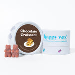 Brown and white wax melt container labeled "Chocolate Croissant" with four bear-shaped wax melts displayed in front.