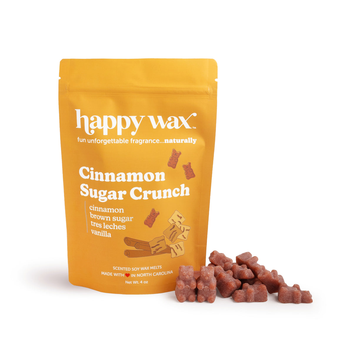 Gold pouch of Happy Wax Cinnamon Sugar Crunch wax melts with brown chunky wax pieces displayed in front.