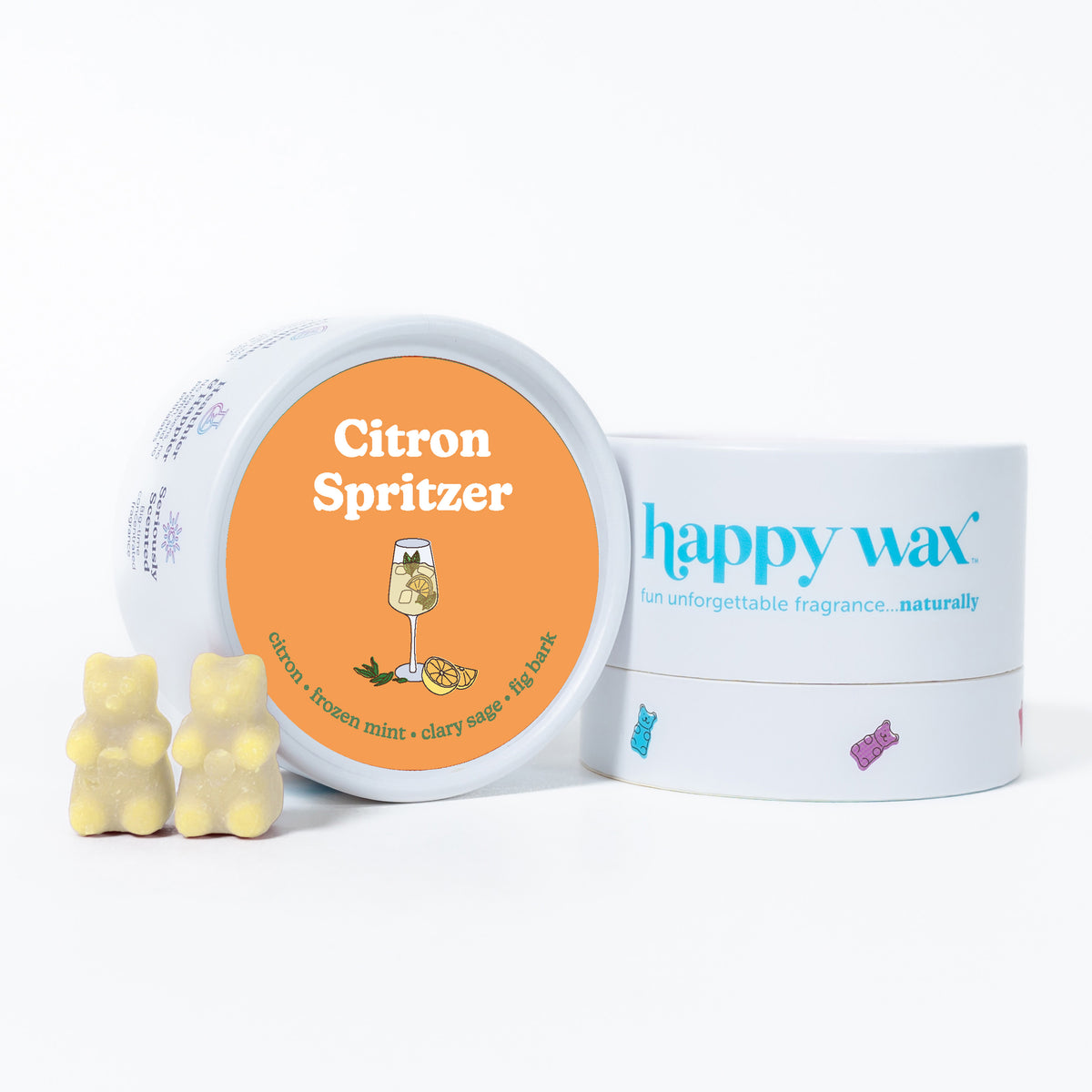 Yellow bear-shaped wax melts next to white container with orange label reading "Citron Spritzer" and "happy wax" branded pack