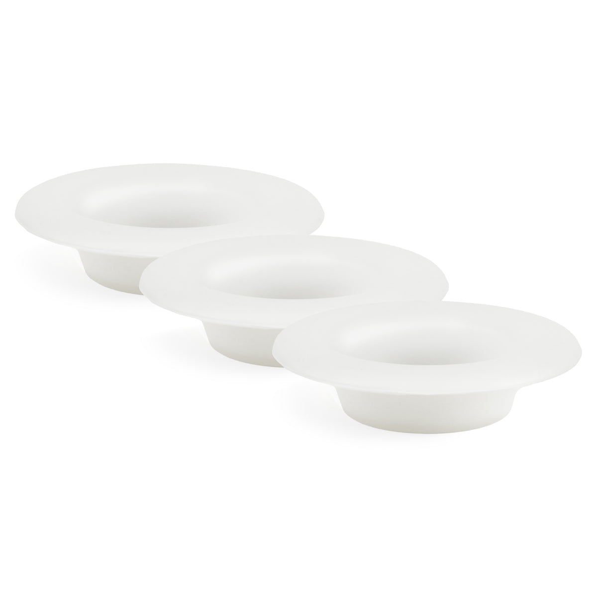 Set of three clear silicone dishes on a white background
