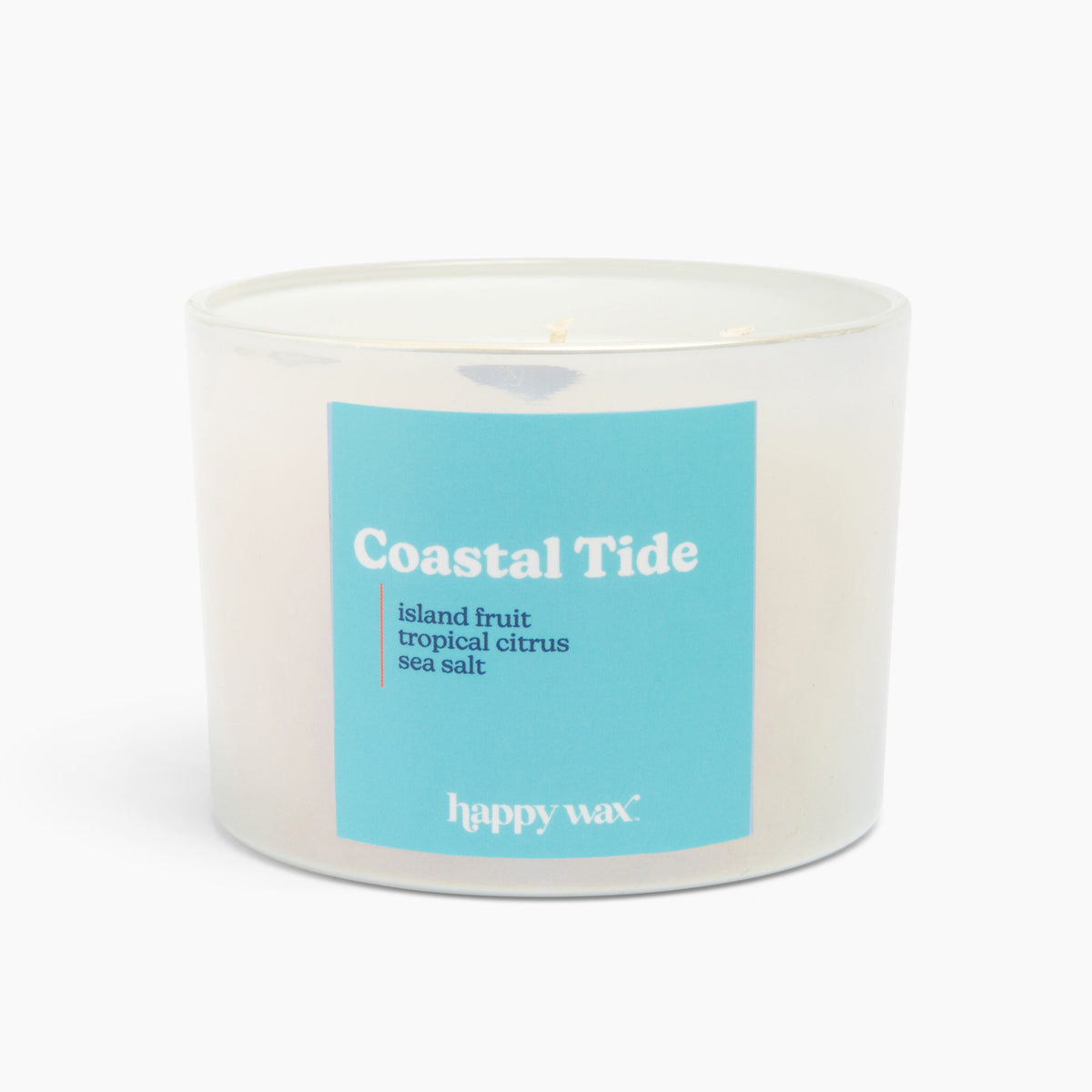 Three-wick candle in clear glass container with turquoise label reading "Coastal Tide" and scent notes of island fruit, tropi