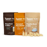 Three Happy Wax scented soy wax melt pouches in brown, orange, and tan with coffee-themed flavors and cream-colored wax melts