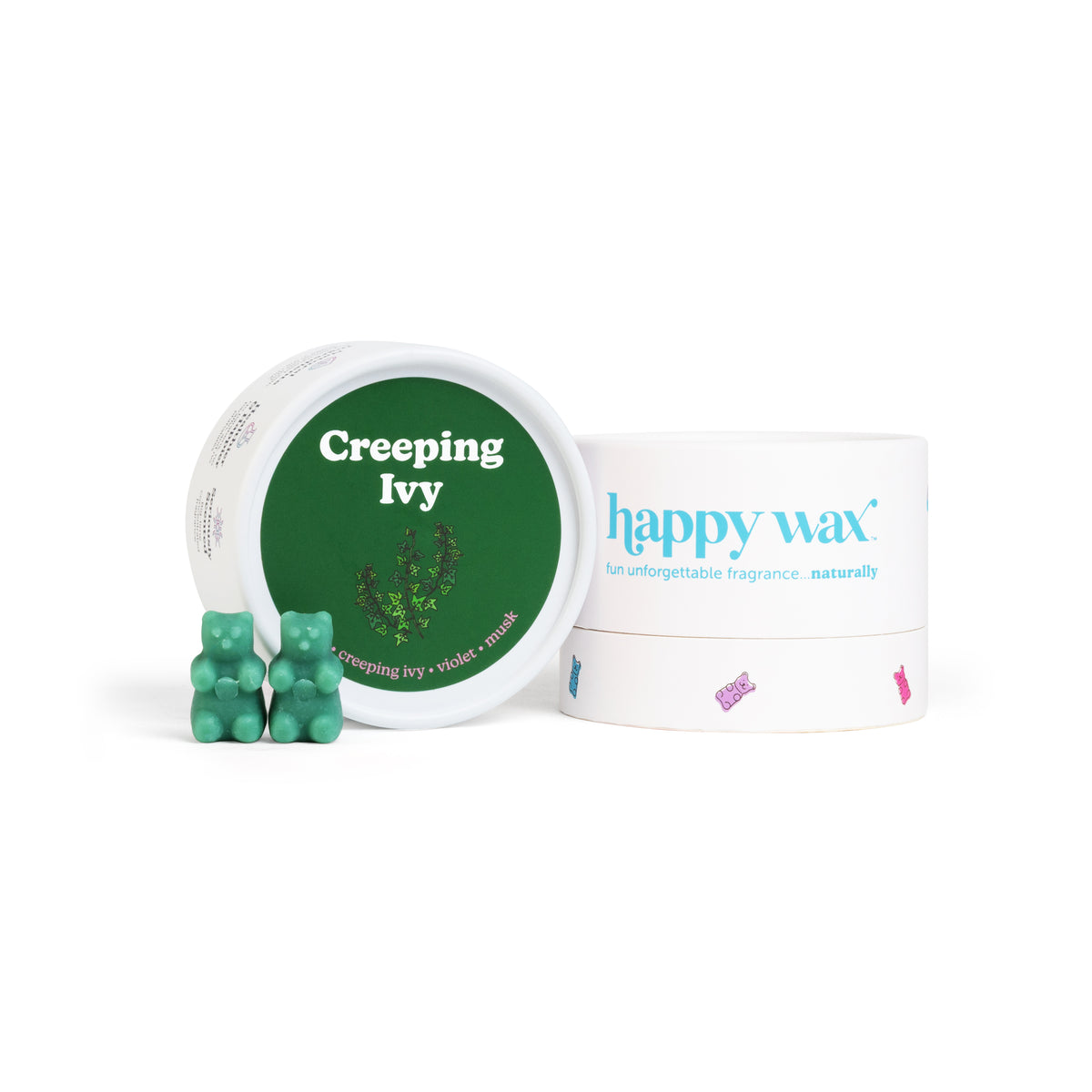 Green wax melts in a white container with green lid labeled "Creeping Ivy" next to Happy Wax packaging and four green bear-sh