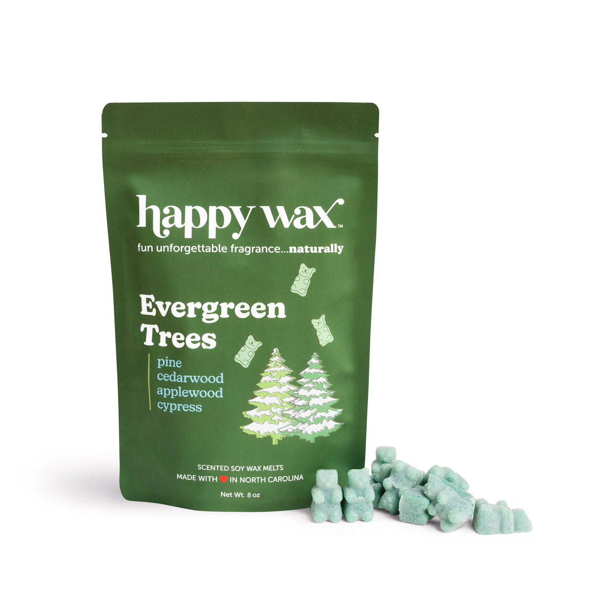 Green pouch of Happy Wax Evergreen Trees scented soy wax melts with pale green wax pieces displayed beside packaging.