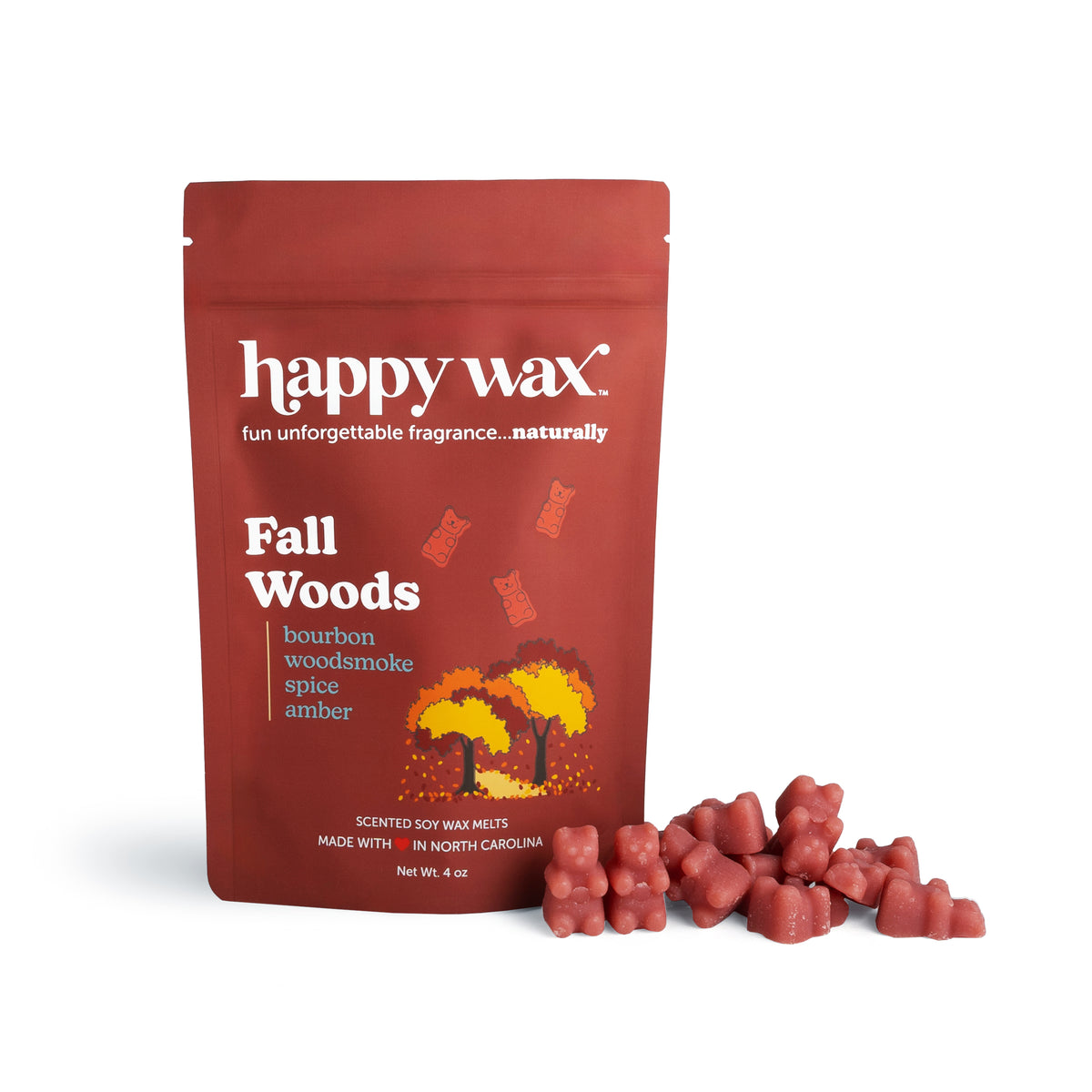 Red pouch of Happy Wax Fall Woods soy wax melts with pink wax chunks displayed in front.