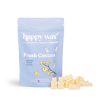 Light blue pouch of Fresh Cotton wax melts with cream-colored wax pieces displayed in front.