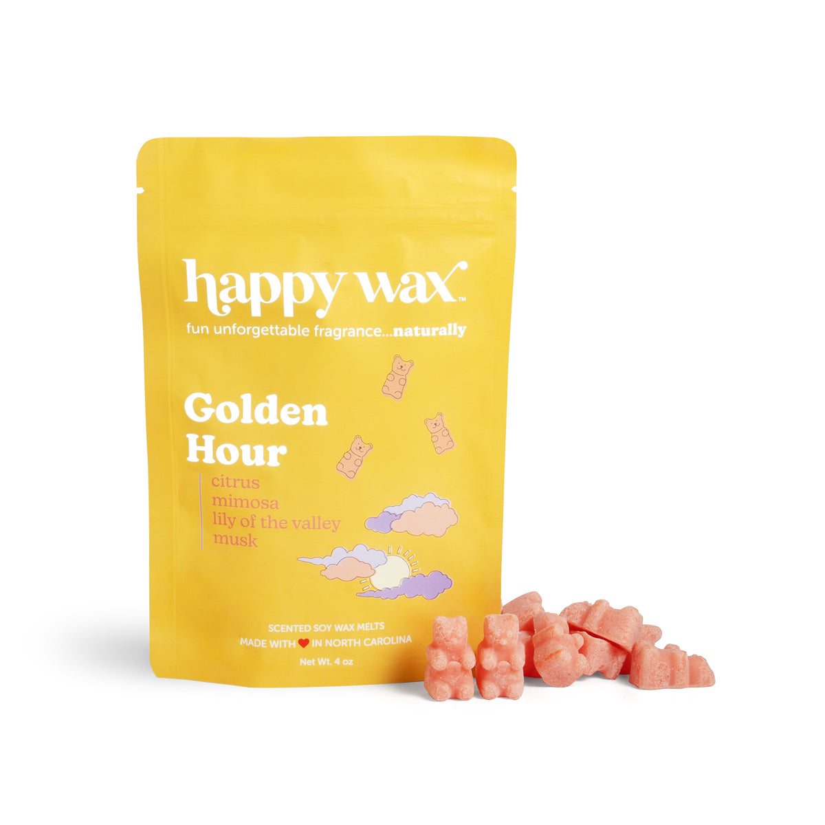 Yellow pouch of Happy Wax brand Golden Hour soy wax melts with coral-colored wax cubes displayed in front.