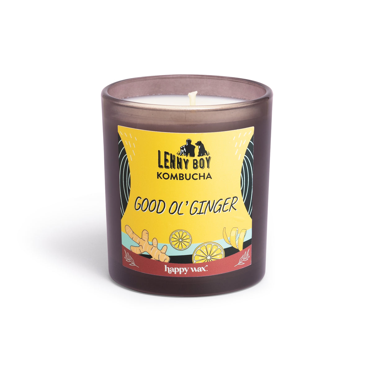 Frosted gray glass candle with single white wick and yellow label featuring ginger and lemon illustrations.