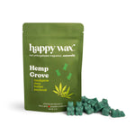 Green pouch of Hemp Grove wax melts with green wax melts scattered beside it.