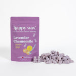 Purple pouch of Happy Wax lavender chamomile wax melts with pile of light purple wax cubes displayed beside it.