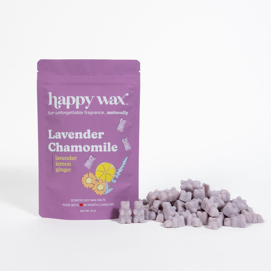 Purple pouch of Happy Wax lavender chamomile wax melts with pile of light purple wax cubes displayed beside it.