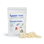White pouch of Happy Wax lavender fields pet-safe wax melts with cream-colored wax melts displayed beside it.