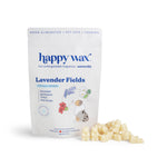 White pouch of Happy Wax Lavender Fields pet wax melts with cream-colored wax cubes scattered in front.