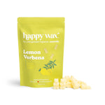 Yellow pouch of Happy Wax lemon verbena scented soy wax melts with cream-colored wax cubes displayed beside it.