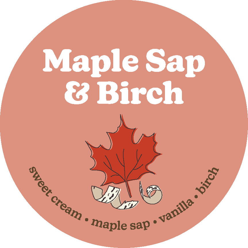 Round label for wax melts with white text, red maple leaf, birch bark pieces, and scent notes on terracotta background.