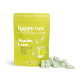 Bright green pouch of Happy Wax matcha latte wax melts with pale green wax chunks displayed beside it.