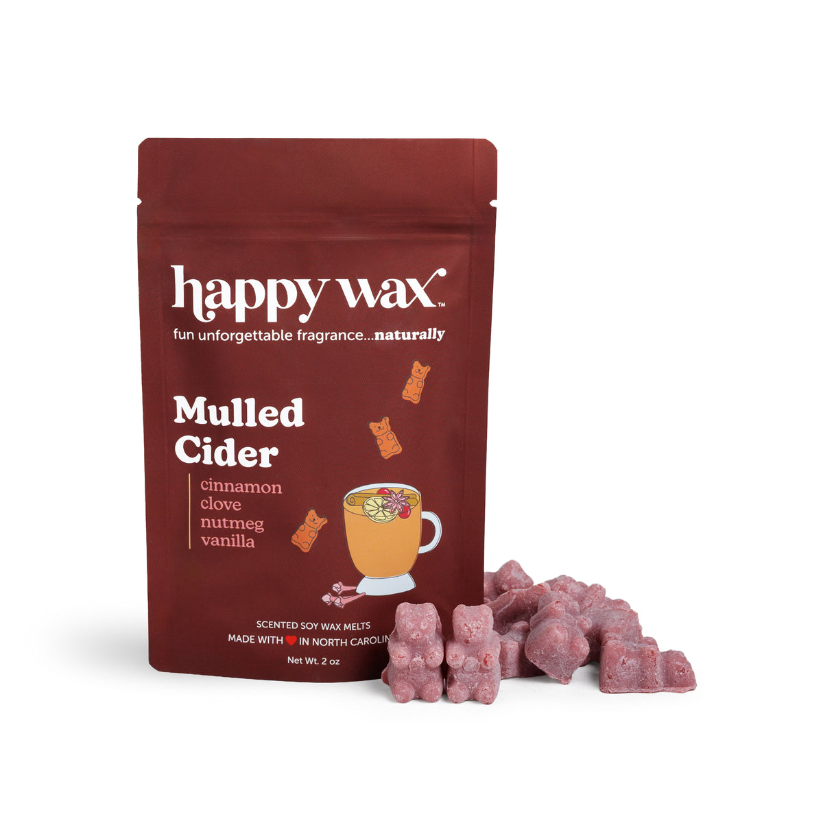 Dark red pouch of Happy Wax Mulled Cider scented soy wax melts with mauve wax pieces displayed beside it.