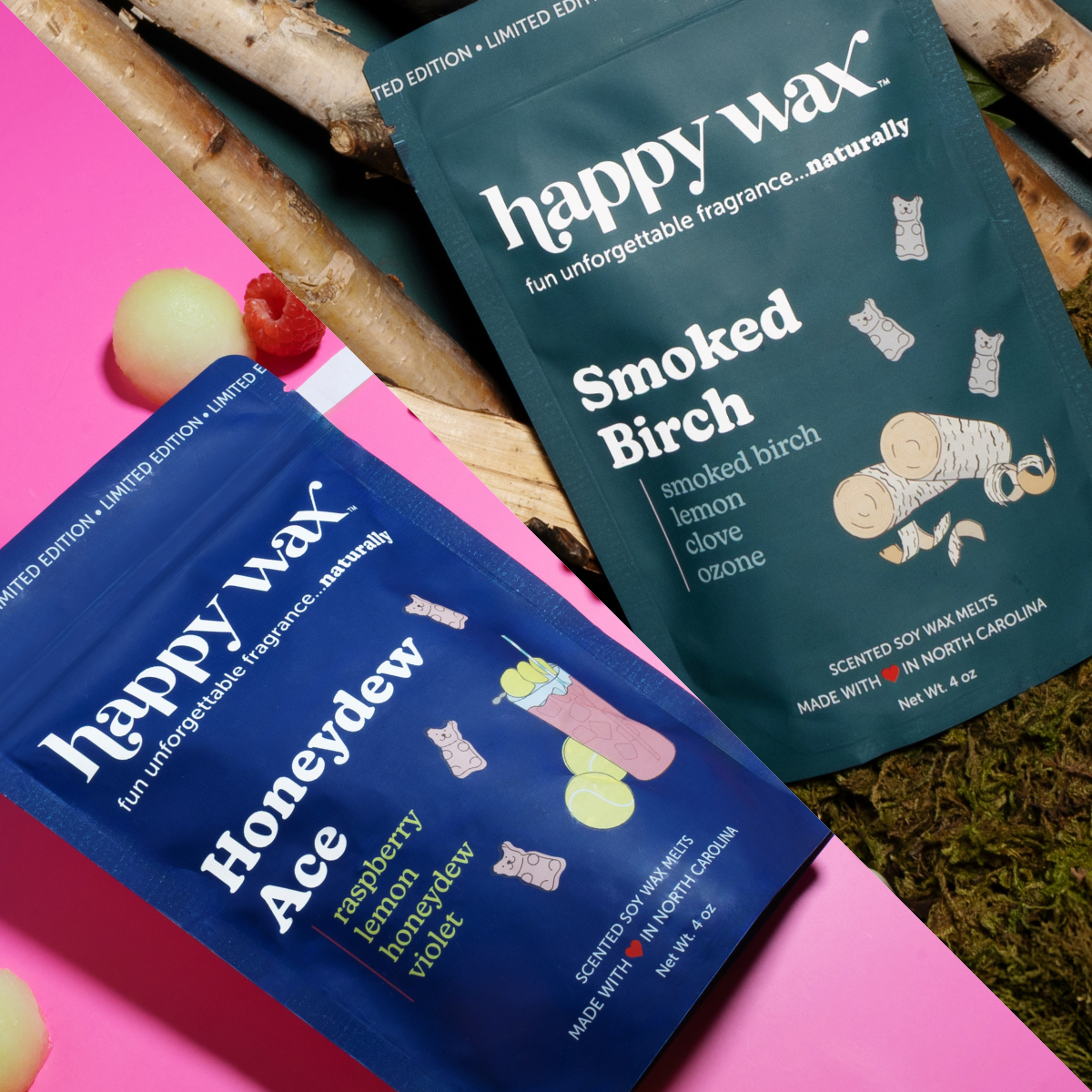 Two Happy Wax scented candle pouches: blue Honeydew Ace and teal Smoked Birch, displayed with birch branches and fruit on pin