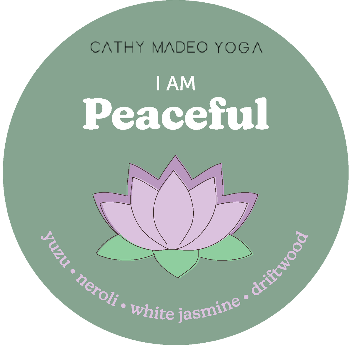 Round sage green label with white text reading "I AM Peaceful," a pink lotus flower illustration, and scent notes including y