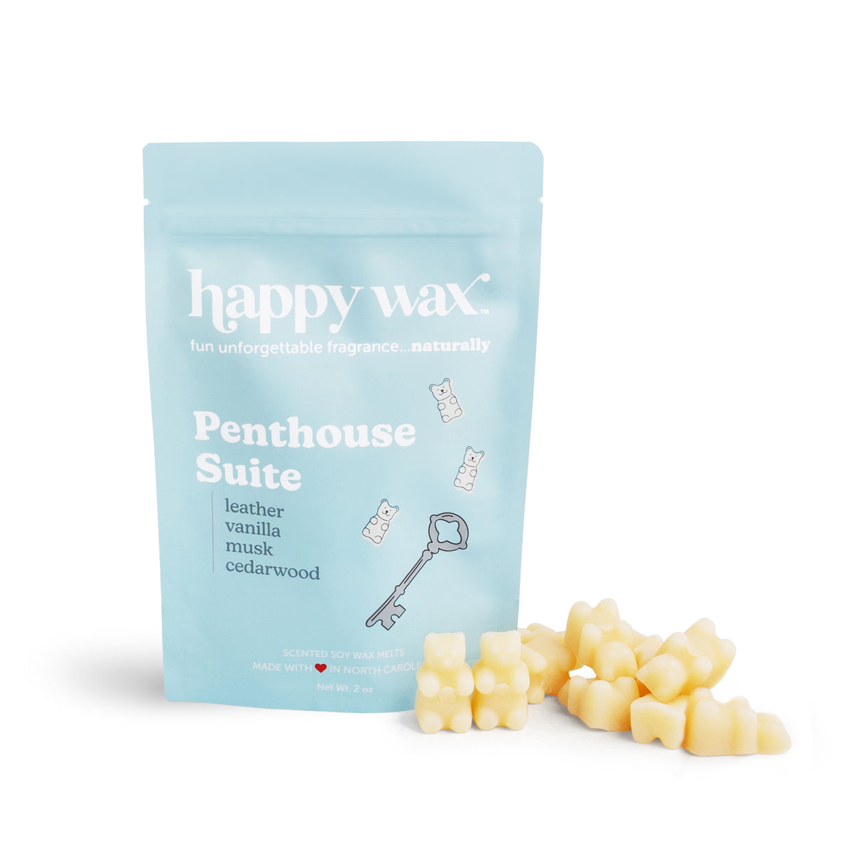 Light blue pouch of Penthouse Suite wax melts with cream-colored bear-shaped wax pieces displayed beside it.