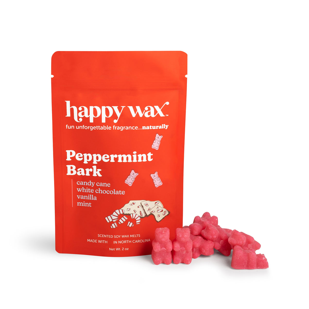 Red Happy Wax pouch of Peppermint Bark soy wax melts with pink wax pieces displayed beside it.