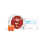Orange wax melts with white container labeled "Persimmon Fizz" and happy wax branded packaging.