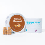 Tan bear-shaped wax melts displayed with white Happy Wax container labeled Salted Caramel.